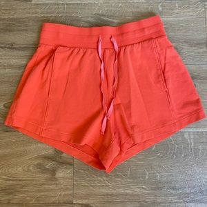 All in motion neon orange shorts